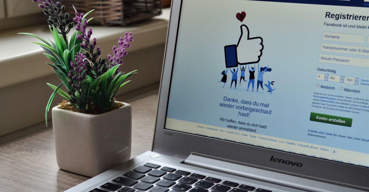 laptop showing Facebook thread