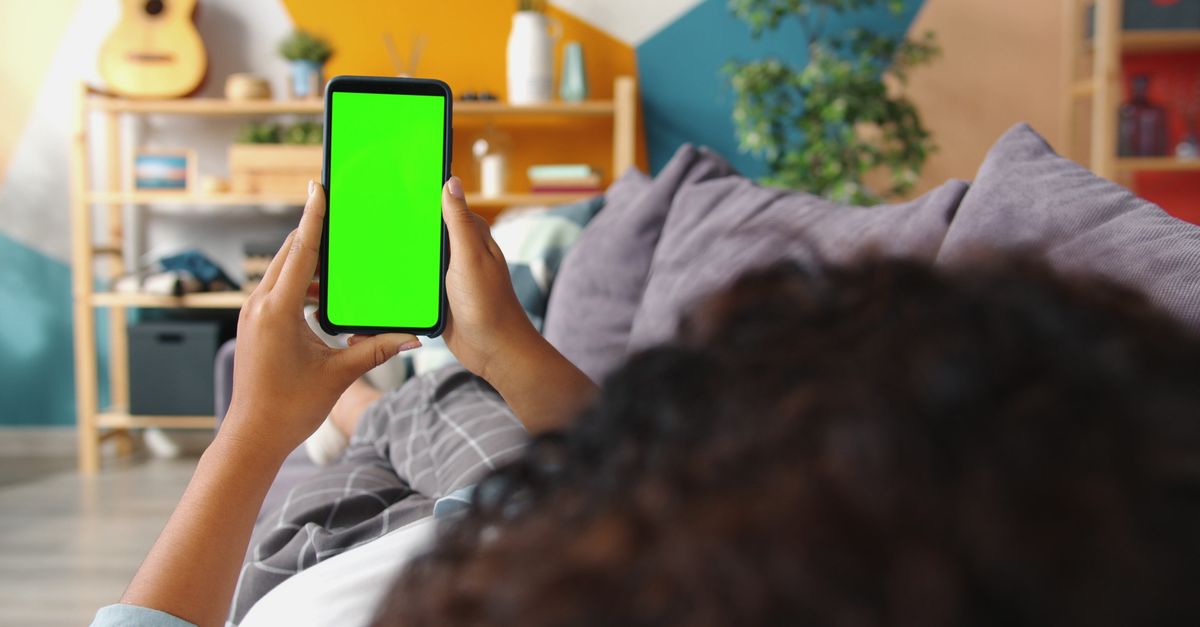 person reacting phone screen