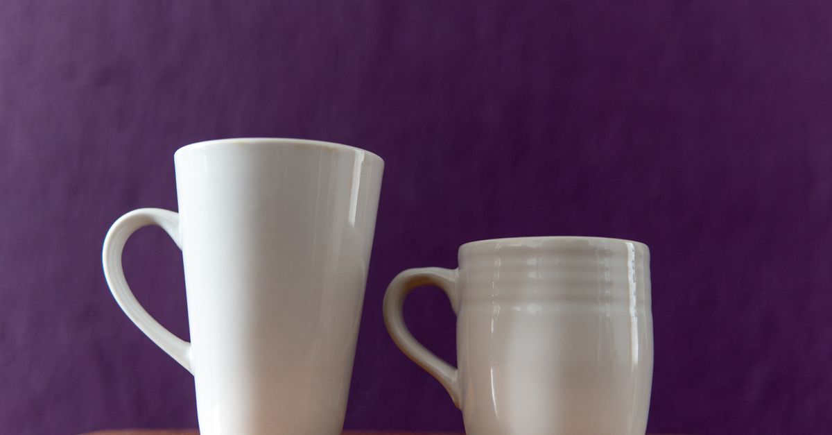 two contrasting coffee cups